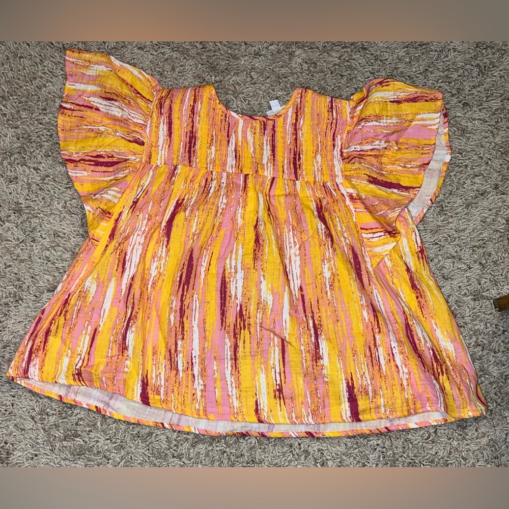 Colorful Lularoe size large women’s Flutter Sleeve Top new with out tags